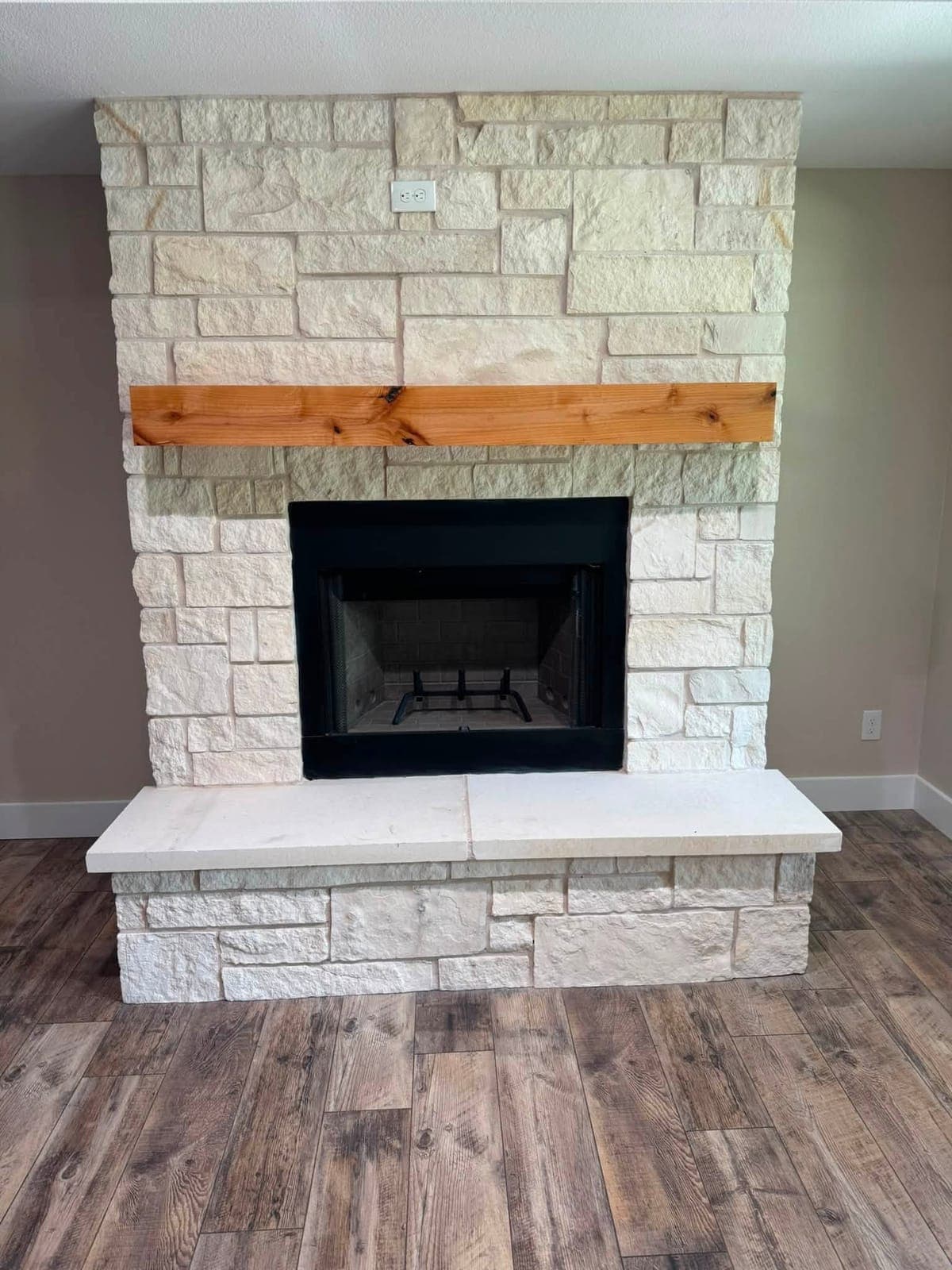 Stone Fireplace with Cedar Mantel — Custom Home Interior project by Bradshaw Beaver Construction in Texoma Area, TX