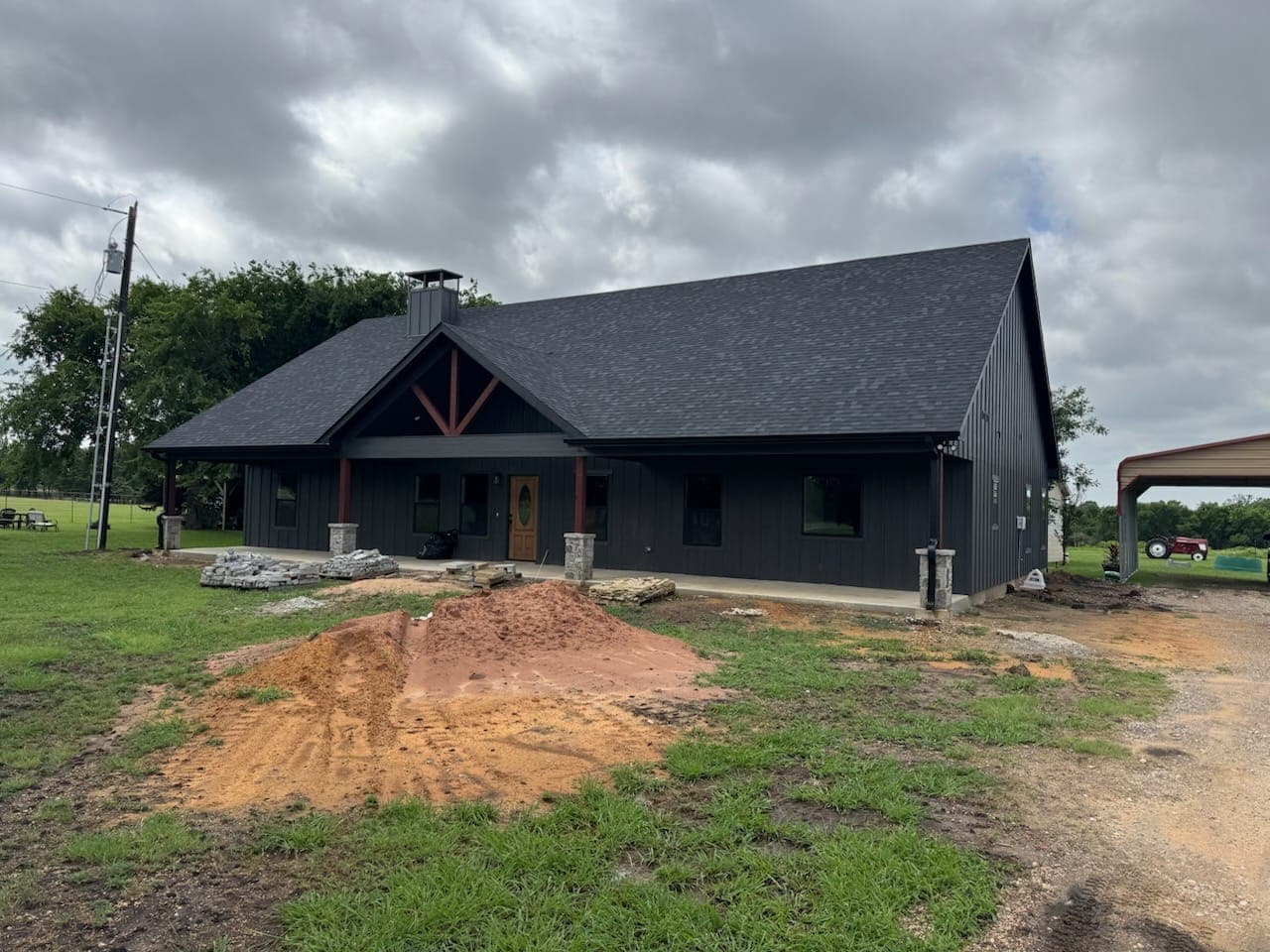 Black Metal-Roof Custom Home — Custom Home project by Bradshaw Beaver Construction in Texoma Area, TX